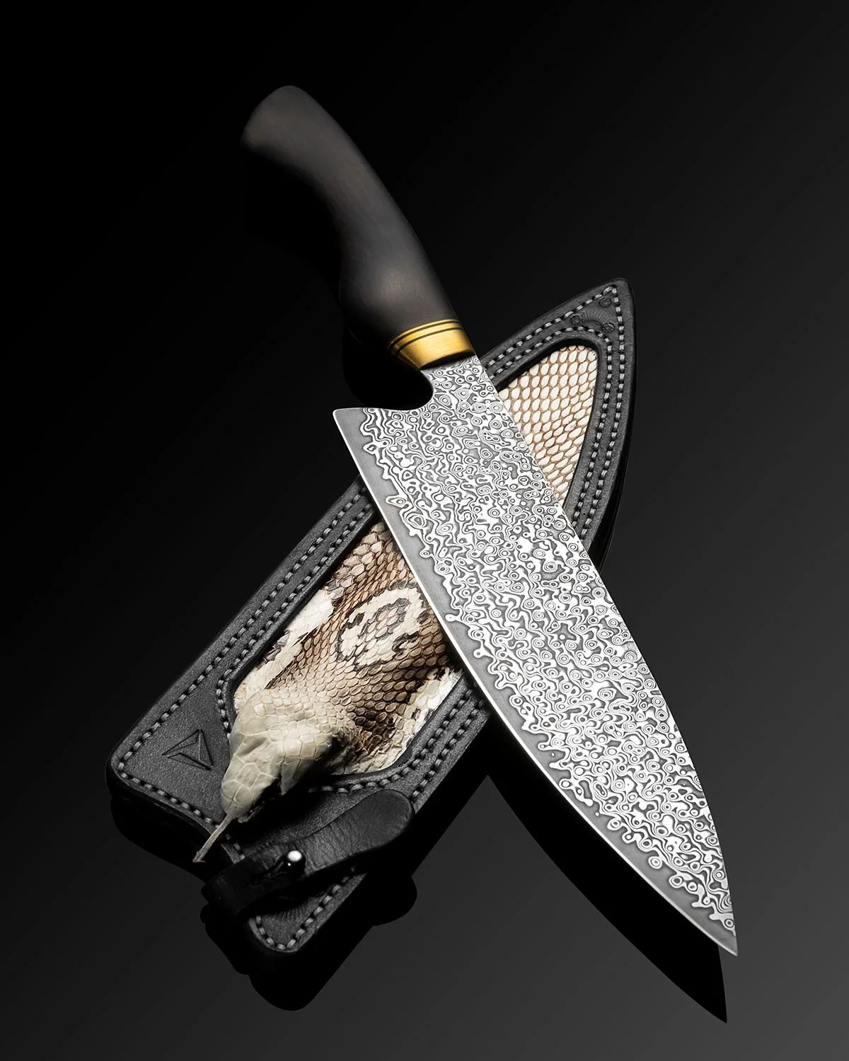 Decorative knife with a snake-shaped sheath