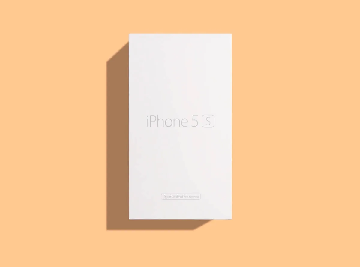 iPhone 5s box with a hard shadow on an orange background