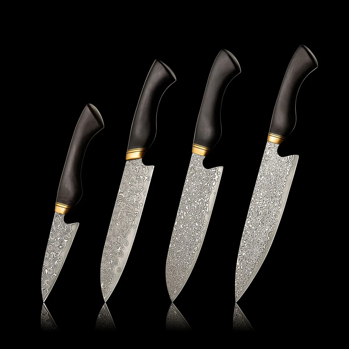 Four decorative knives on a black background