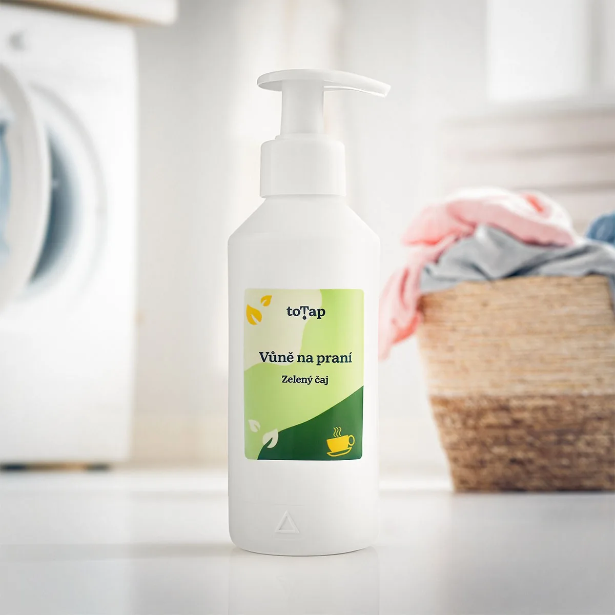 Laundry perfume bottle in a laundry room with a washing machine and a laundry basket in the background